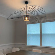 Black rattan hat led chandelier metal ceiling fan with circular radial design and warm-toned light for dining room decorbites black rattan
