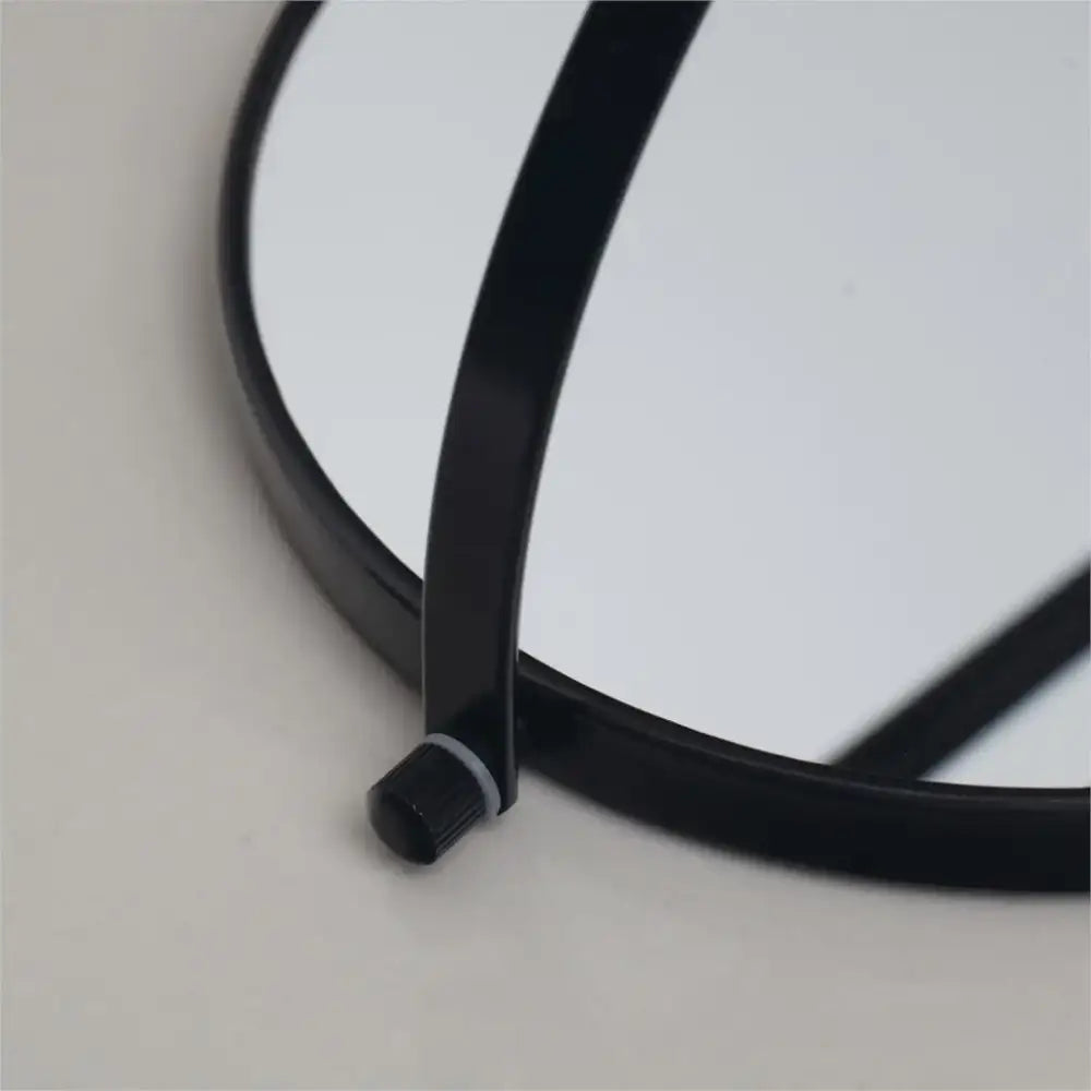 Black round magnifying wall mounted beauty mirror with sleek minimalist frame and black knob for bedroom decorbites 3x magnifying