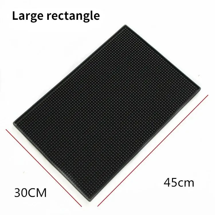 Black rubber coffee bar cup mat with raised dots and textured surface for kitchen use by decorbites coffee bar
