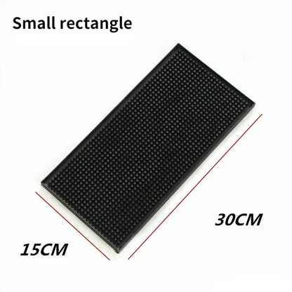 Black rubber coffee bar cup mat with raised dot textured surface for kitchen drain by decorbites coffee bar