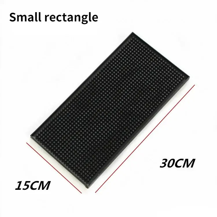 Black rubber coffee bar cup mat with raised dot textured surface for kitchen drain by decorbites coffee bar