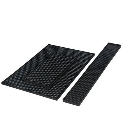Set of three black rubber raised dot coffee bar cup mats with textured non slip surfaces by decorbites coffee bar
