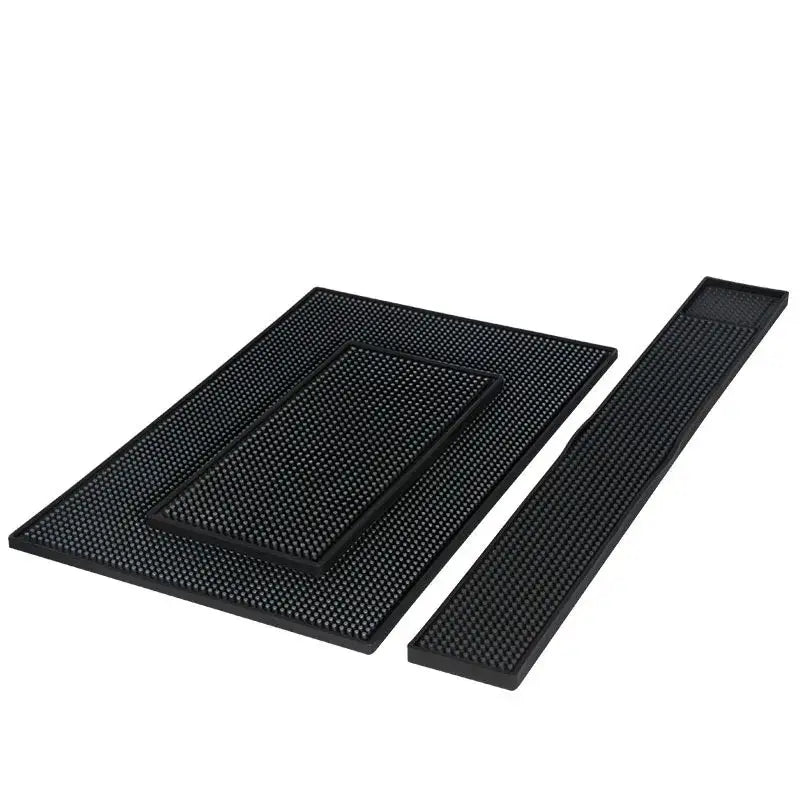 Set of three black rubber raised dot coffee bar cup mats with textured non slip surfaces by decorbites coffee bar