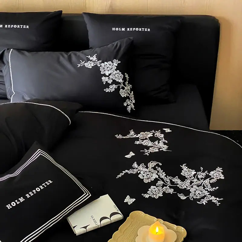 Black satin bedding set with elegant white egyptian cotton flowers embroidery and delicate butterfly motifs