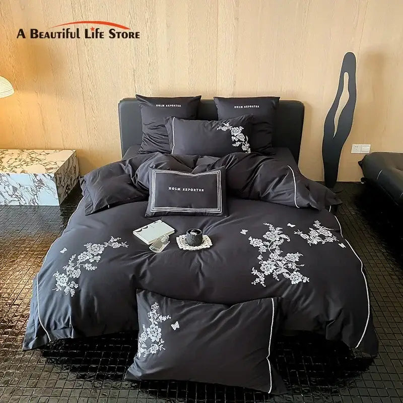 Black satin cotton flowers embroidery bedding set featuring intricate white floral embroidery and piping details