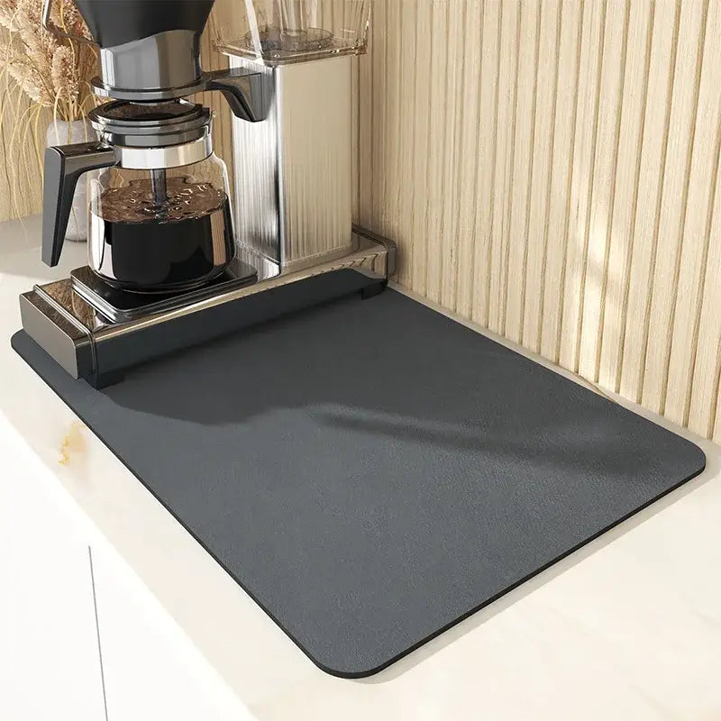 Dark gray black silicone absorbent decorbites espresso machine mat with a smooth textured surface for kitchen coffee decor