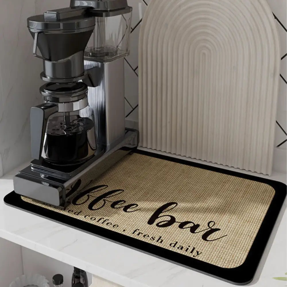 Black silicone absorbent espresso machine mat with burlap texture black border and coffee bar script for decorbites espresso