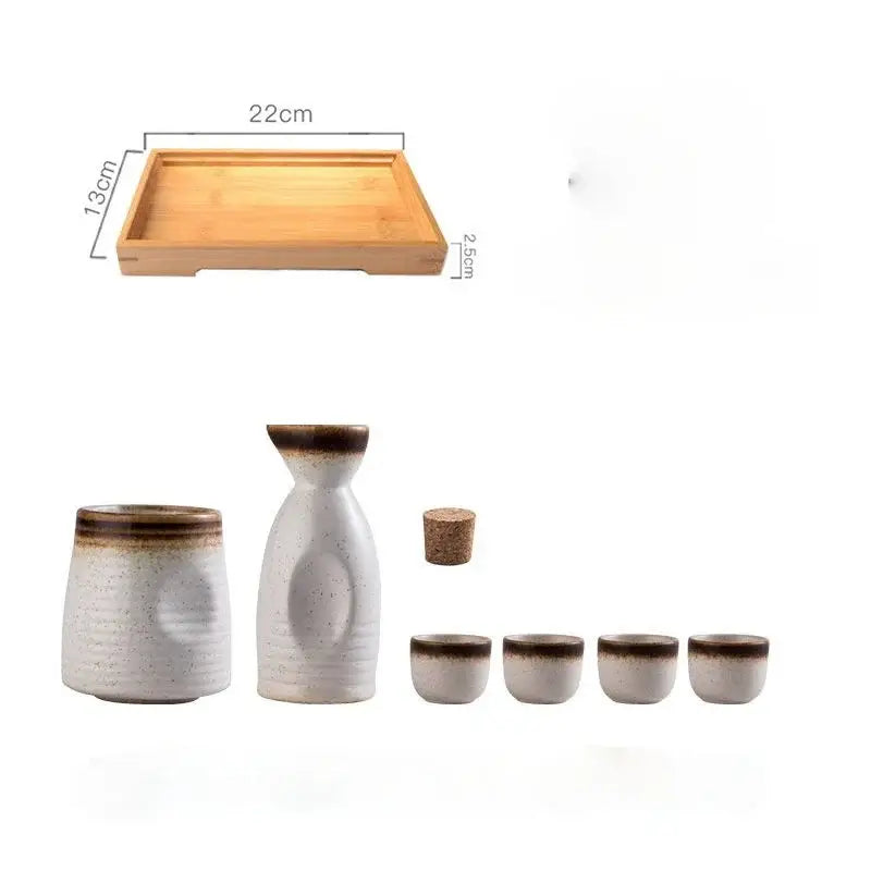 White ceramic wine sake set with brown glazed rims textured surfaces includes bottle cups glasses and cork stopper decorbites ceramic wine
