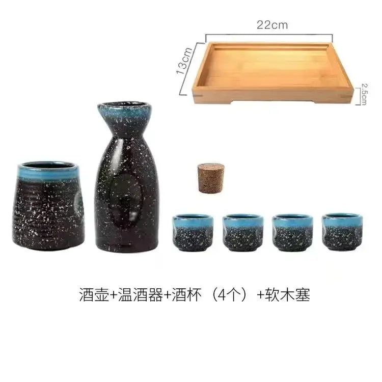 Black speckled ceramic wine sake set with heater and glossy blue rim on light wood tray for dining room decorbites ceramic wine
