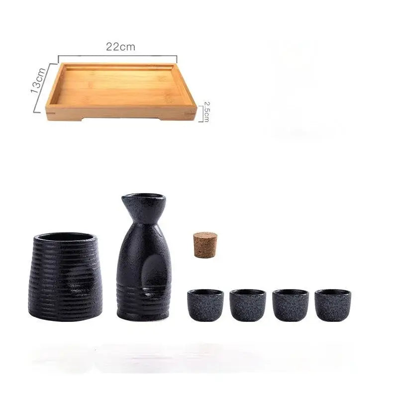 Black speckled ceramic wine sake set with heater and textured cups on wooden tray for dining room decorbites ceramic wine