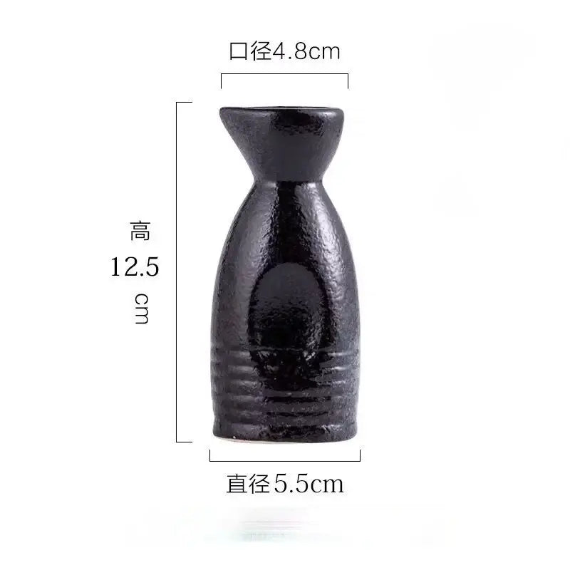 Black speckled ceramic wine sake bottle with textured surface and subtle horizontal ridges for decorbites ceramic wine set