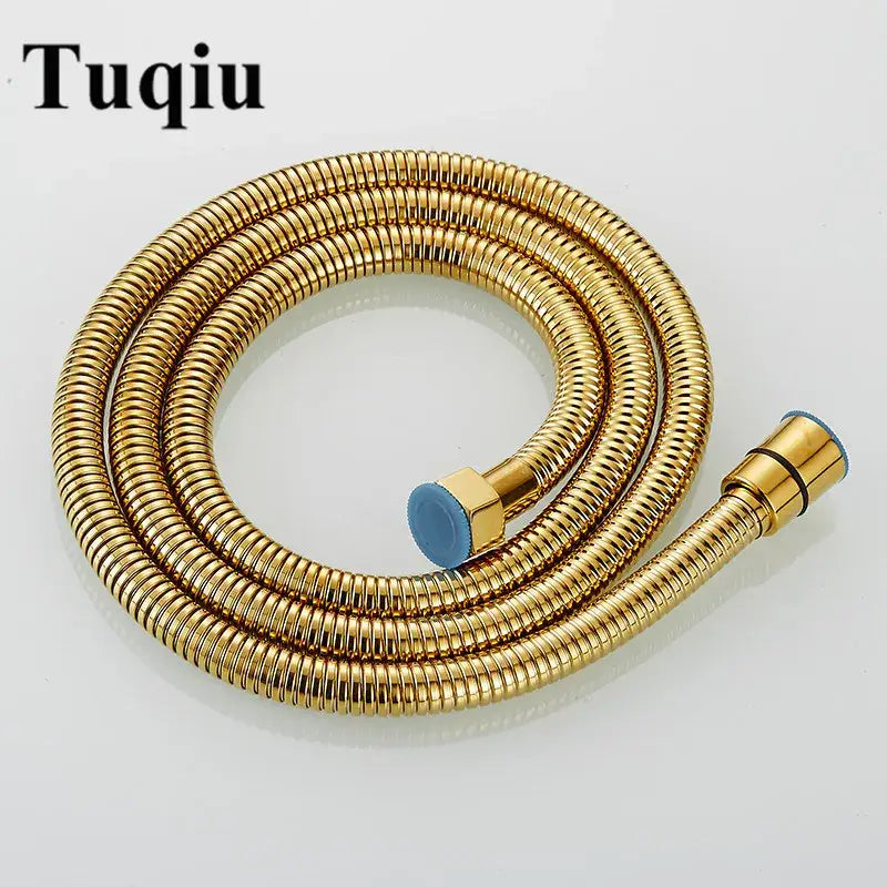 Gold-colored stainless steel flexible shower hose with brass fittings and blue rubber nozzle cap for bathroom use