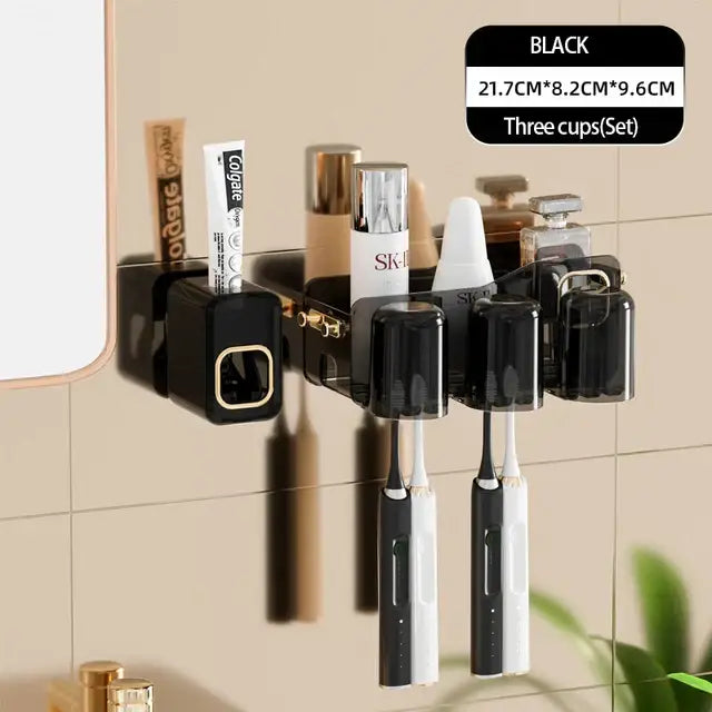 Black translucent inverted toothbrush holder with integrated electric toothpaste dispenser and three cup slots by decorbites