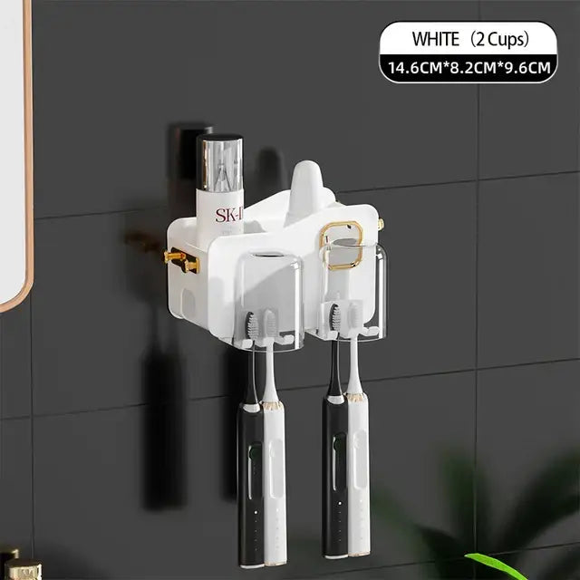 White dual-cup inverted toothbrush holder with gold accents and transparent cups for decorbites bathroom storage rack