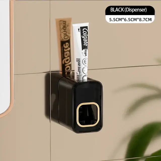 Black translucent inverted toothbrush holder with gold-trimmed toothpaste dispenser holding colgate oxygel tube for decorbites inverted toothbrush use