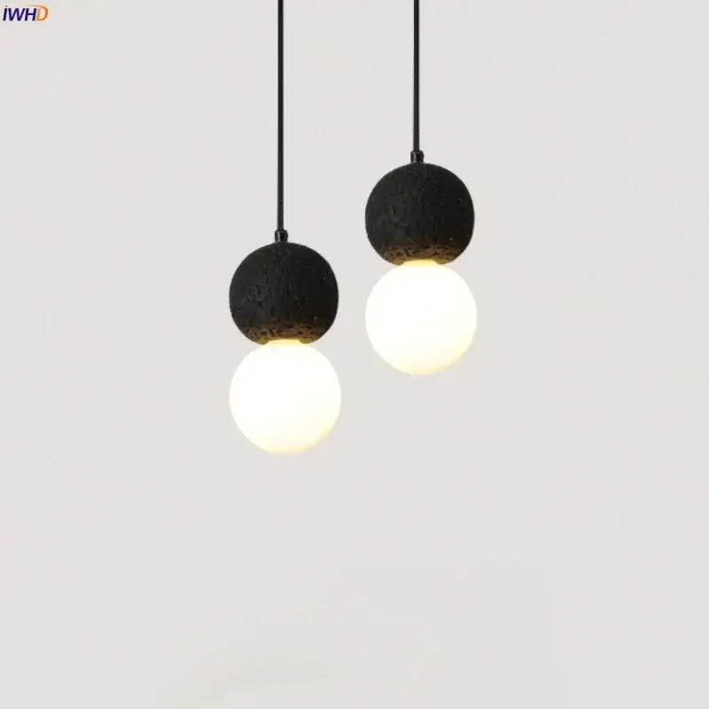 Black travertine led pendant light with black lava stone and frosted glass globe for dining room decorbites black travertine