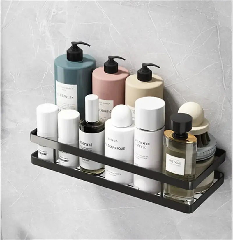 Black two tier metal bathroom shelf holding assorted toiletries designed for bathroom shelf shower storage use