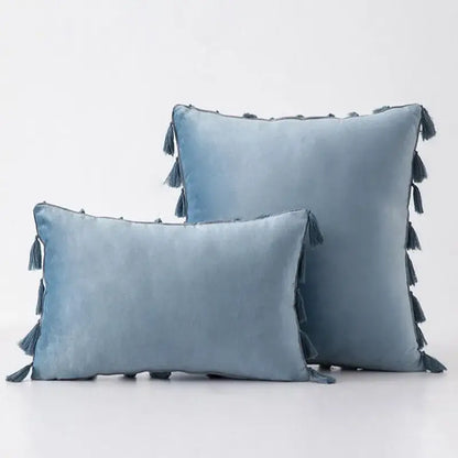 Soft blue velvet pillow cover with tassel fringe edges for living room decor by decorbites black velvet collection