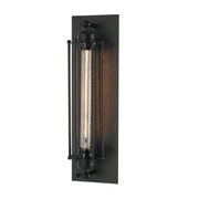 Black vintage industrial wall sconce with exposed edison bulb and vertical glass enclosure for bedroom decorbites design