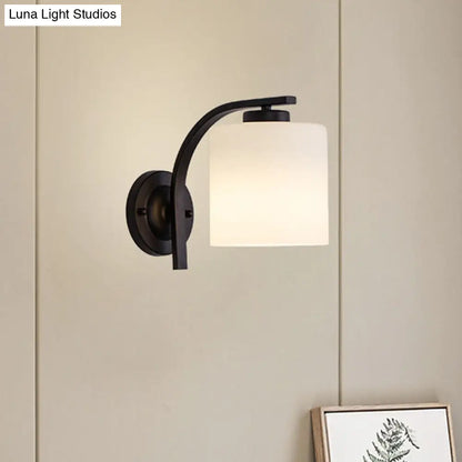Black Wall Sconce with Ivory Glass Cylinder and Curved Arm - 1-Light, Wall Mounted Lamp