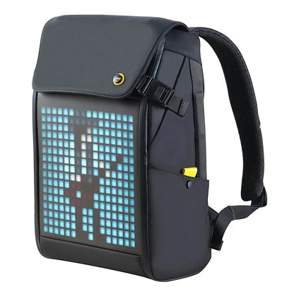 Black waterproof laptop backpack with rgb led screen featuring a glowing pixelated design in bedroom setting