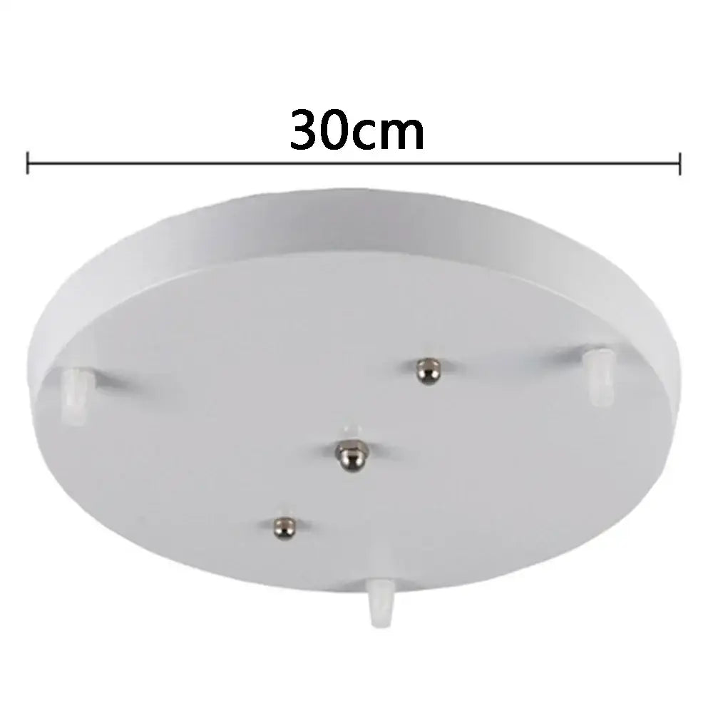 White circular pendant light base canopy plate with three metallic ball sockets and four white plastic clips for dining room