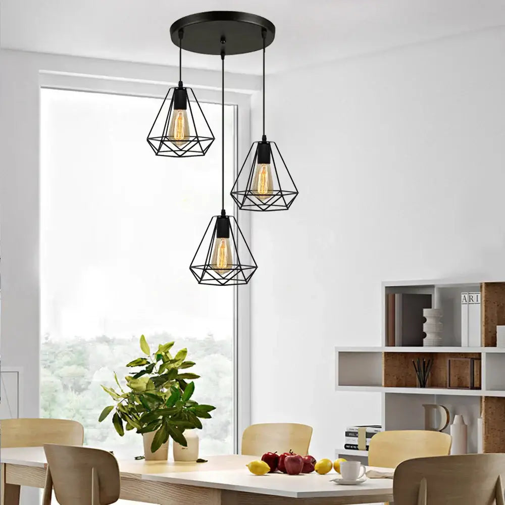 Black geometric wireframe pendant light with exposed filament bulbs and base canopy plate for dining room chandelier