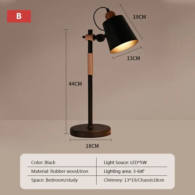 Black desk lamp with matte finish and rubber wood joints featuring a cylindrical shade for decorbites adjustable wood desk