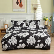 Black and white branch flower duvet cover set featuring bold white floral pattern on black fabric for bedroom decorbites branch flower