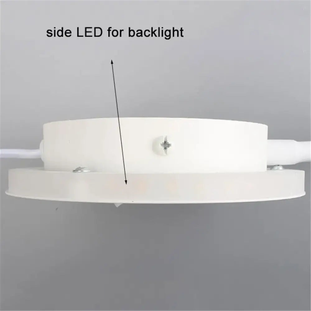 White circular led backlight fixture with side-mounted light and screws on the back of decorbites corded gooseneck wall sconce