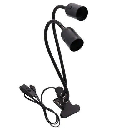 Black and white flexible gooseneck desk light with two adjustable heads and decorbites clip for bed headboard use