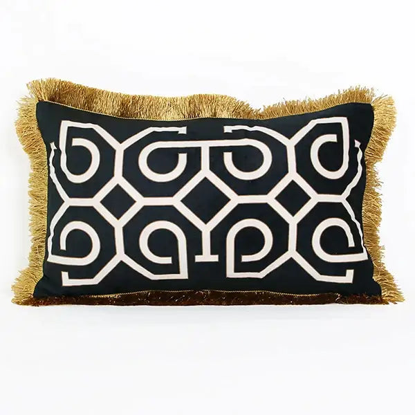 Black rectangular pillow cover with white geometric embroidery and gold fringe trim for decorbites geometric fringed lumbar decor