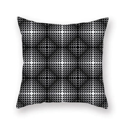 Square throw pillow with bold black and white geometric star stripe print featuring interlocking triangles forming diamonds
