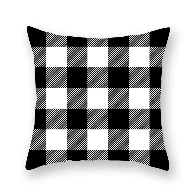 Black and white buffalo check throw pillow with bold geometric star stripe print for bedroom decor
