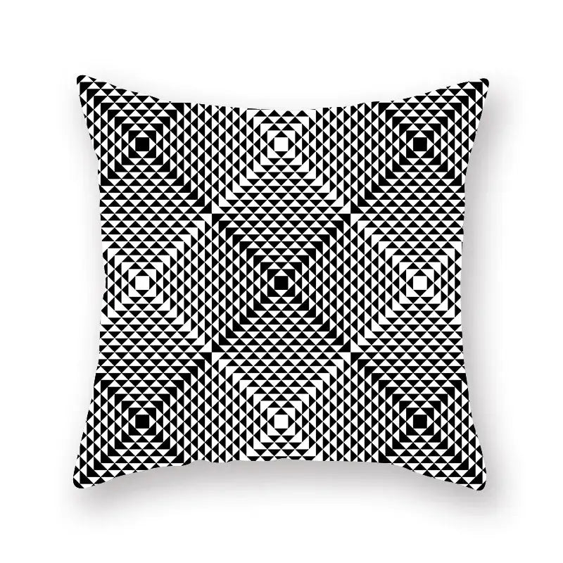 Square throw pillow with bold black and white geometric star stripe print featuring concentric squares for bedroom decor