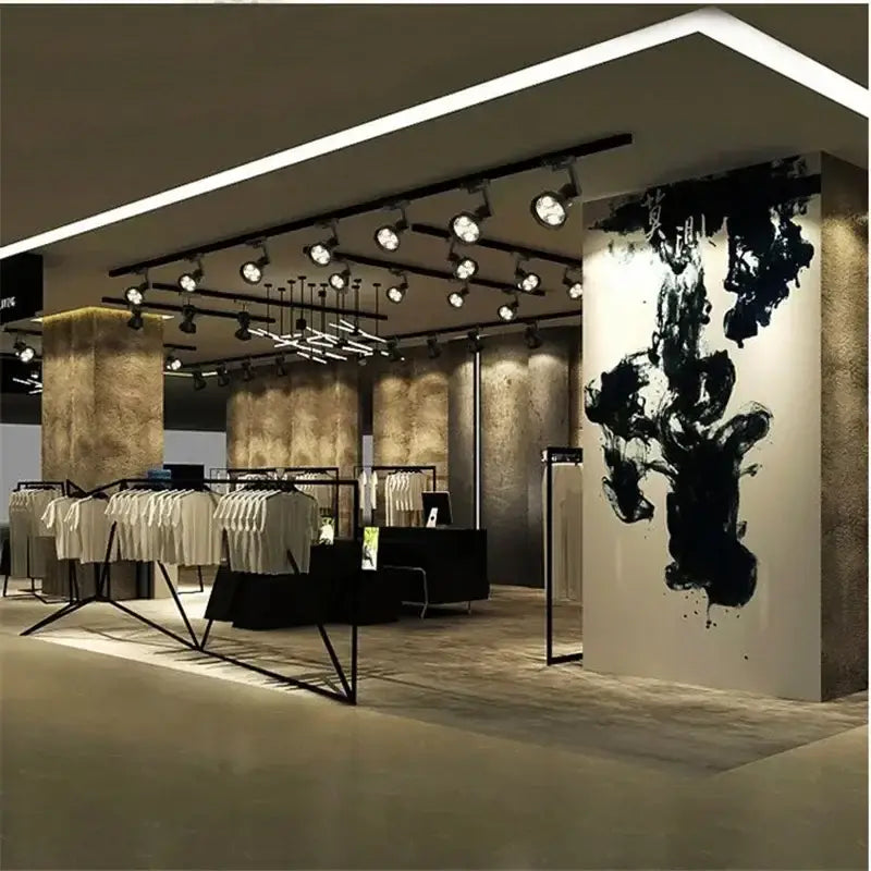 Black and white metallic decorbites cob ceiling spotlight with 4 led lights featuring black ink abstract mural on textured wall
