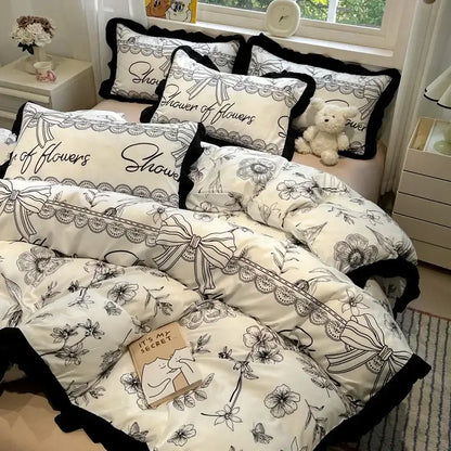 Black white printed floral bedding set with lace trim and ribbon motifs by decorbites black white for bedroom linens decor