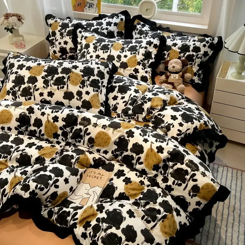 Black and gold pear-patterned black white printed bedding set with ruffled edges from decorbites black white collection