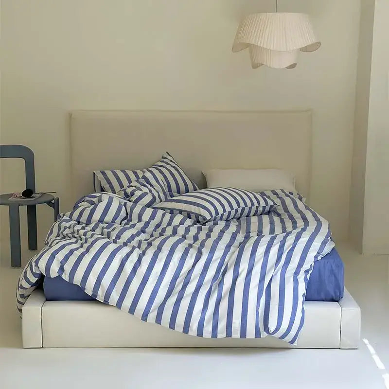 Blue and white striped cotton duvet cover set featuring soft fabric finish for bedroom bedding use