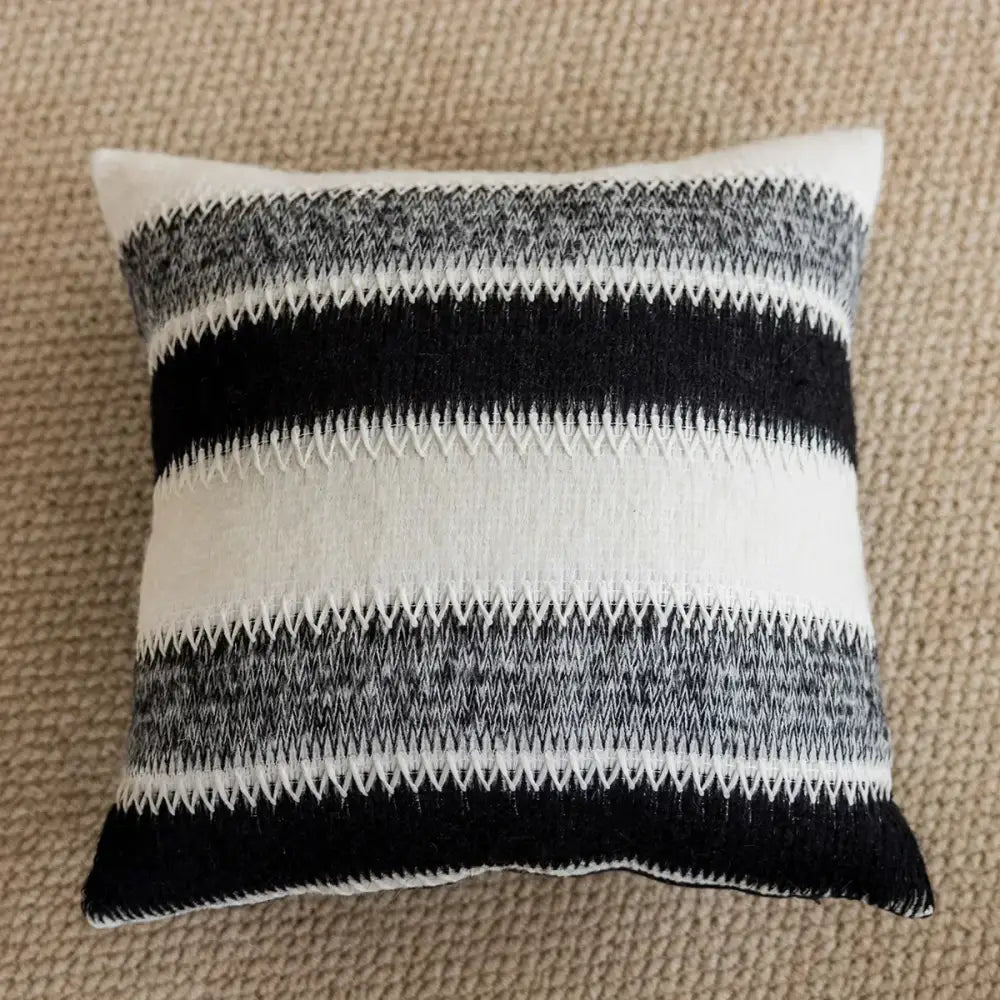 Black and white striped knitted crochet cushion cover in knit fabric with zigzag stitch detail for living room decorbites