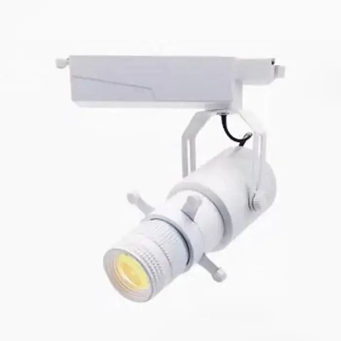 White adjustable track lighting fixture with cylindrical head and visible led bulb for wireless remote led spotlight use