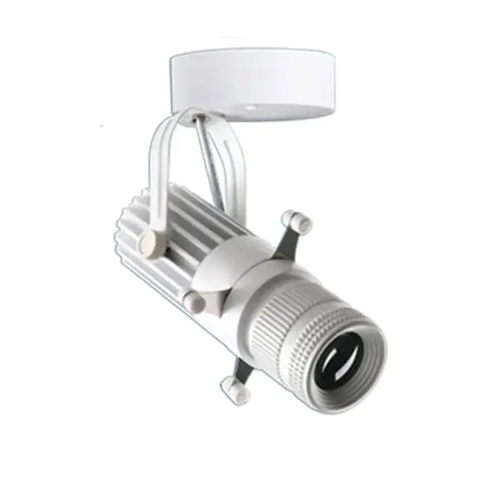 White led track light with cylindrical body and ribbed heat sink paired with black wireless remote led spotlight