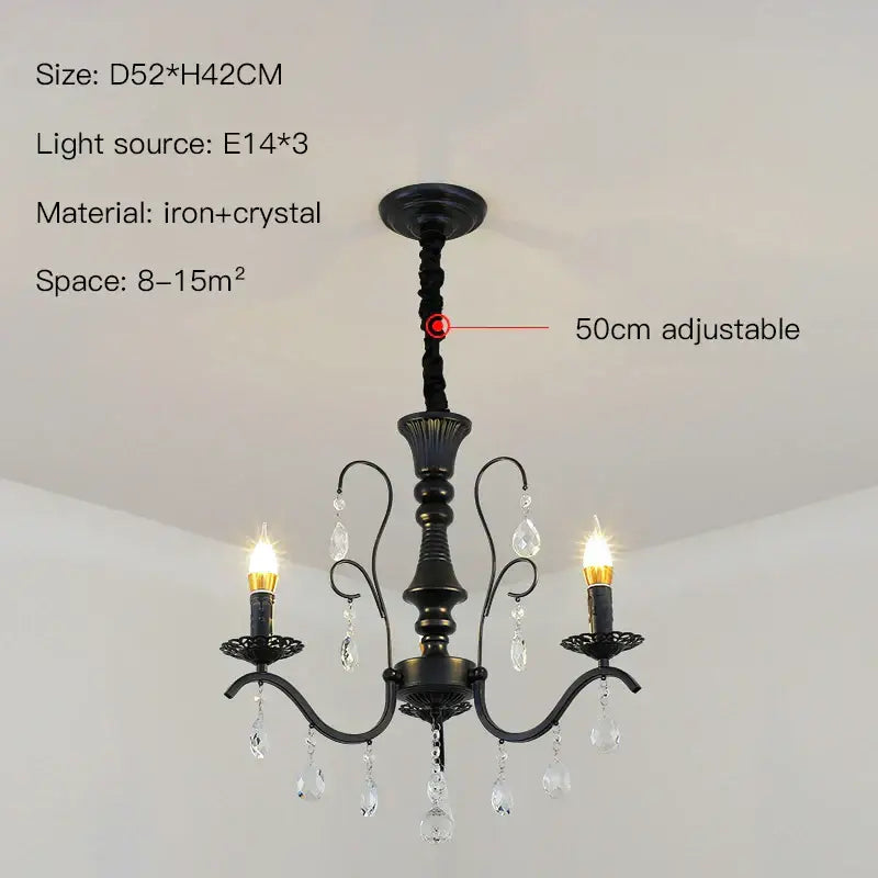 Black wrought iron crystal chandelier with candle-style bulbs and crystal droplets for dining room lighting