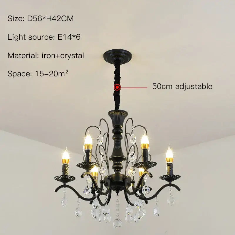 Black wrought iron chandelier with crystal droplets and candle style lights for dining room use