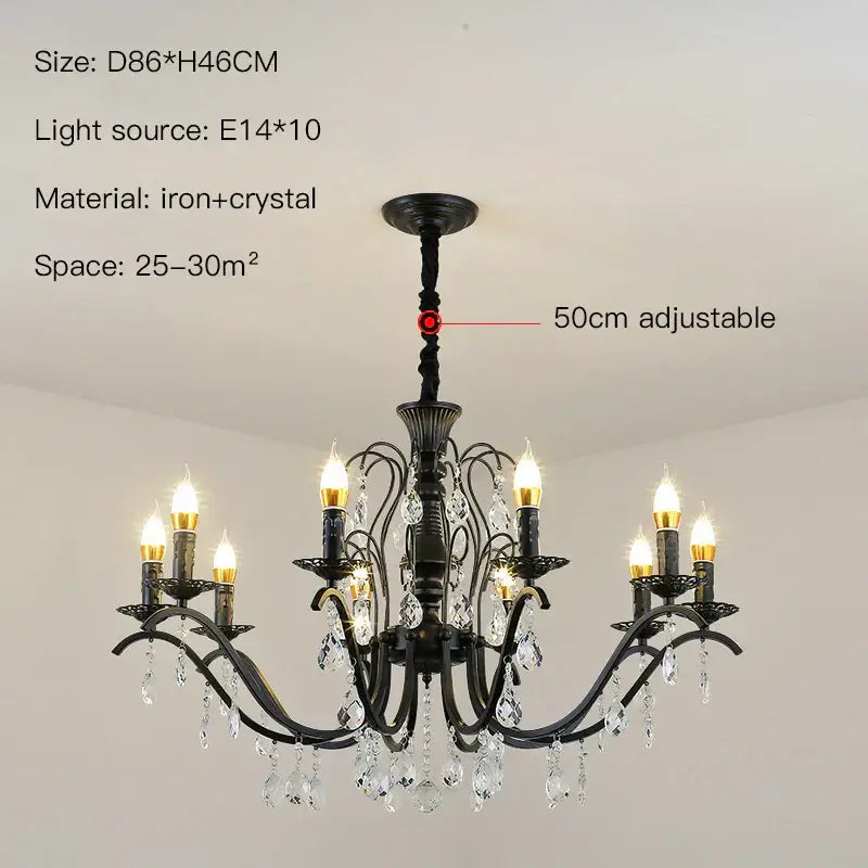 Black wrought iron crystal chandelier with candle-style bulbs and droplets designed for dining room use