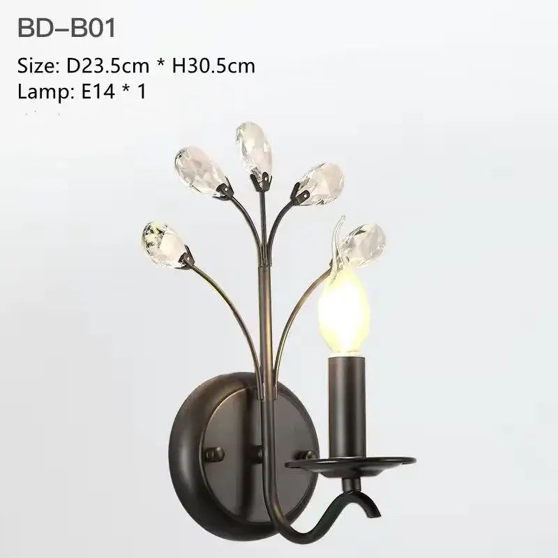 Black wrought iron wall sconce with five crystal teardrop accents and candle-style bulbs for decorbites crystal led chandelier