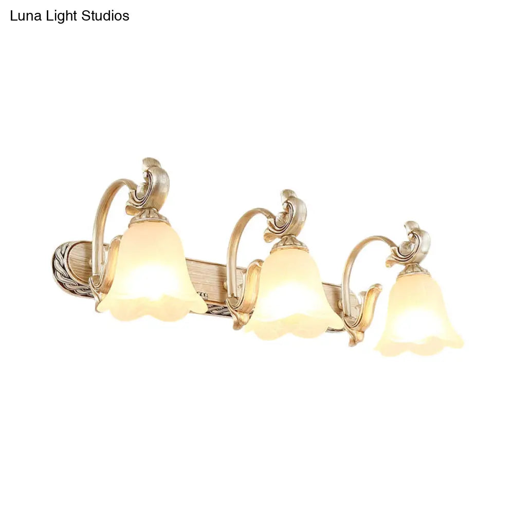 Lámpara de pared Blossom Vanity Lighting - Aplique de pared de latón y cristal color crema con brazo curvo