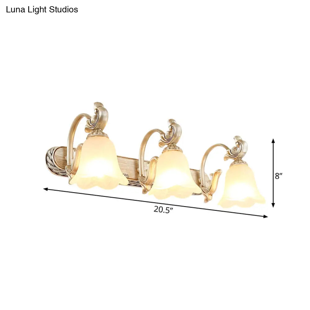 Lámpara de pared Blossom Vanity Lighting - Aplique de pared de latón y cristal color crema con brazo curvo