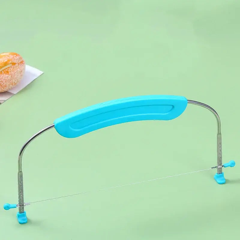 Blue adjustable stainless steel cake slicer with plastic handles and tension knobs baking tool by decorbites