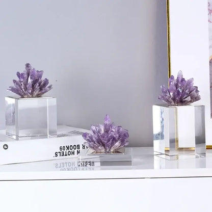 Purple amethyst crystal clusters displayed on clear acrylic bases as agate stone crystal sculpture for living room decorbites
